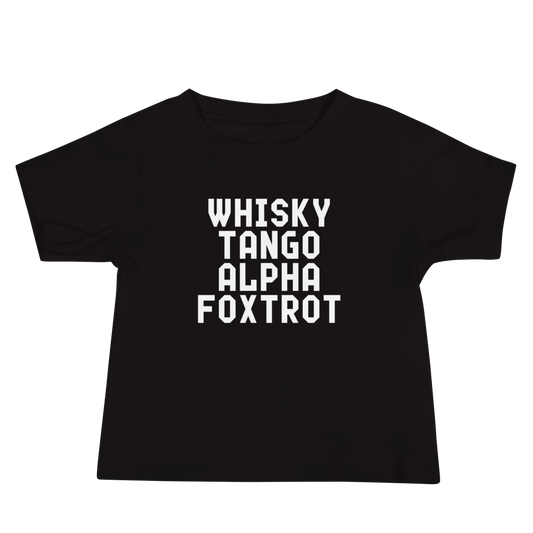"Whisky Tango Alpha Foxtrot" printed on a black baby jersey short sleeve tee laying on a flat surface