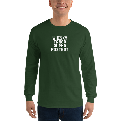 "Whisky Tango Alpha Foxtrot" printed on a forest green men's long sleeve shirt worn by a male