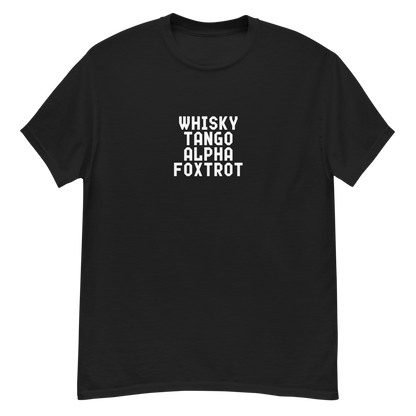 "Whisky Tango Alpha Foxtrot" printed on a black unisex classic tee laying on a flat surface