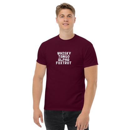 "Whisky Tango Alpha Foxtrot" printed on a maroon unisex classic tee worn by a male