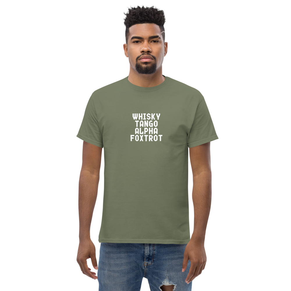 "Whisky Tango Alpha Foxtrot" printed on a military green unisex classic tee worn by a male