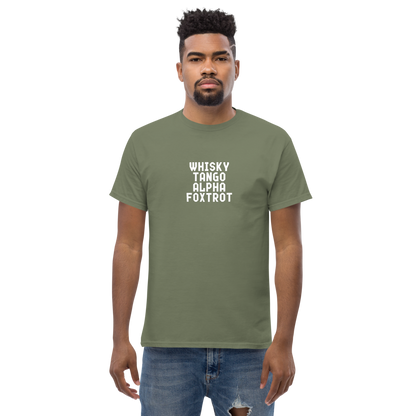 "Whisky Tango Alpha Foxtrot" printed on a military green unisex classic tee worn by a male