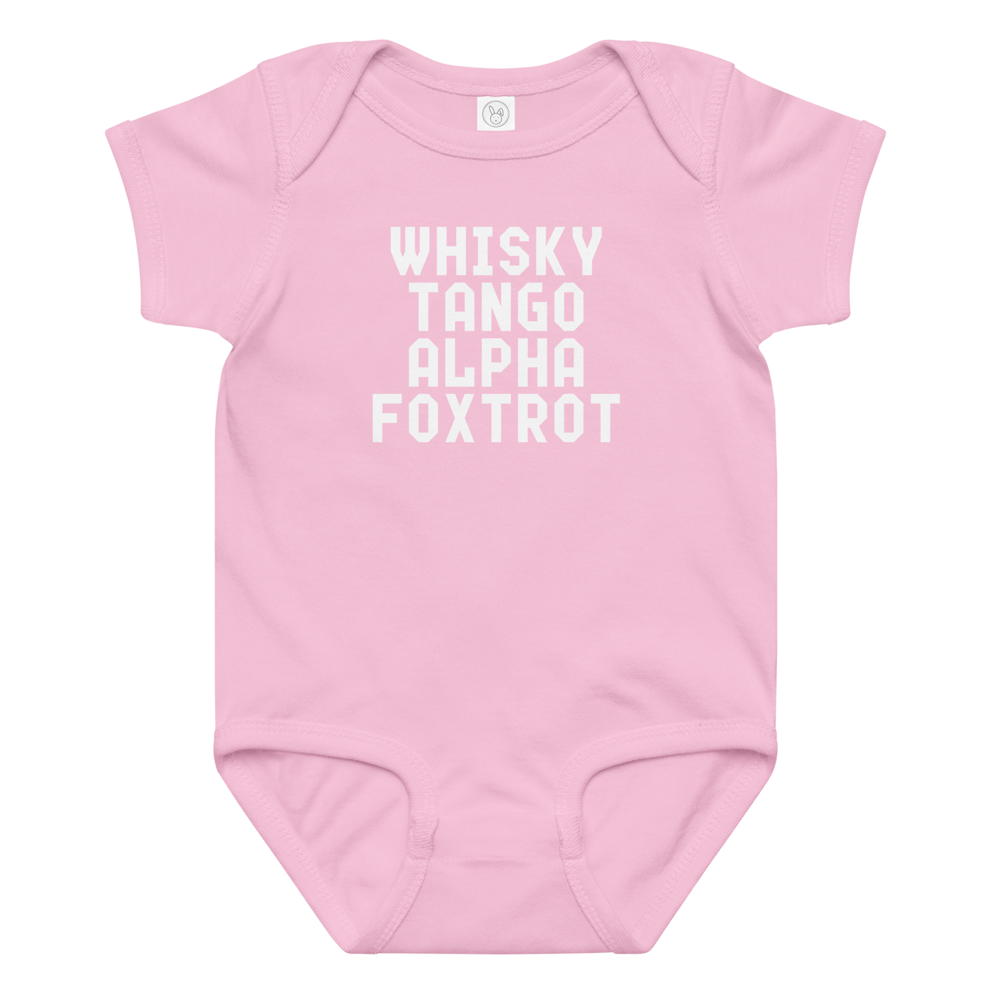 "Whisky Tango Alpha Foxtrot" printed on a pink baby jersey bodysuit laying on a flat surface amongst other clothes