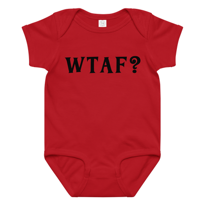 "WTAF?" printed on a red baby jersey bodysuit laying on a flat surface amongst other clothes