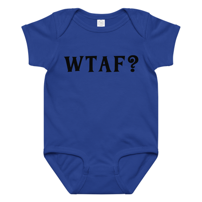 "WTAF?" printed on a royal baby jersey bodysuit laying on a flat surface amongst other clothes