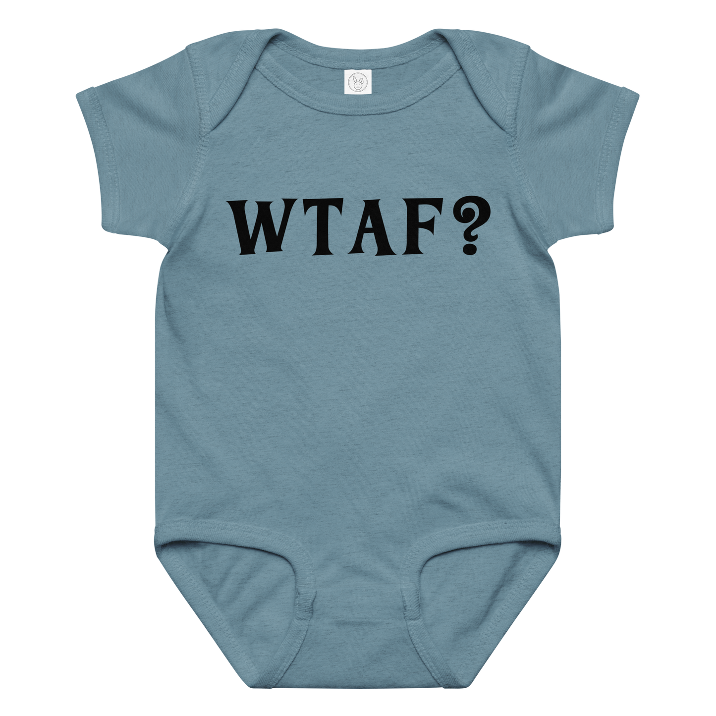 "WTAF?" printed on a vintage indigo baby jersey bodysuit laying on a flat surface amongst other clothes