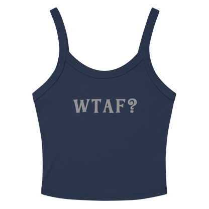 "WTAF?" printed on a solid navy blend women's micro-rib tanktop laying on a flat surface amongst sunglasses and shorts