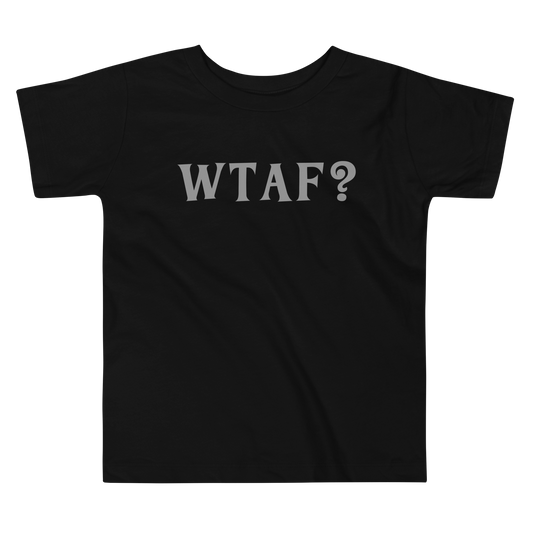"WTAF?" printed on a black toddler short sleeve tee laying on a flat surface