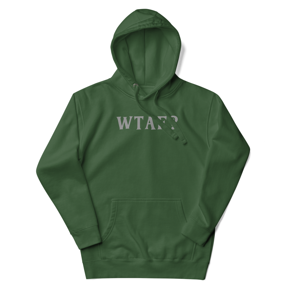 "WTAF?" printed on a forest green unisex hoodie laying on a flat surface with the hood up