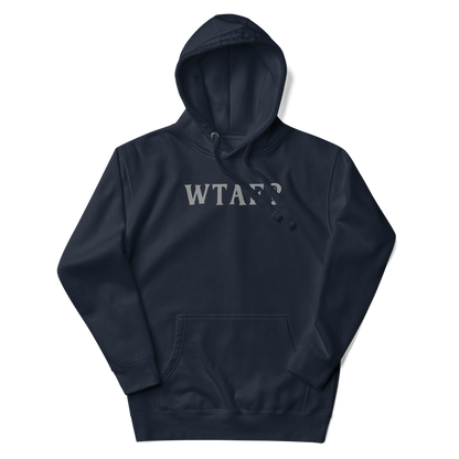 "WTAF?" printed on a navy blazer unisex hoodie laying on a flat surface with the hood up