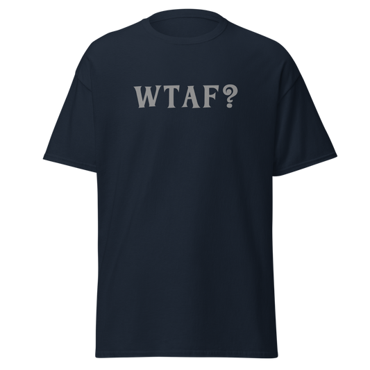 "WTAF?" printed on a navy unisex classic tee laying on a flat surface