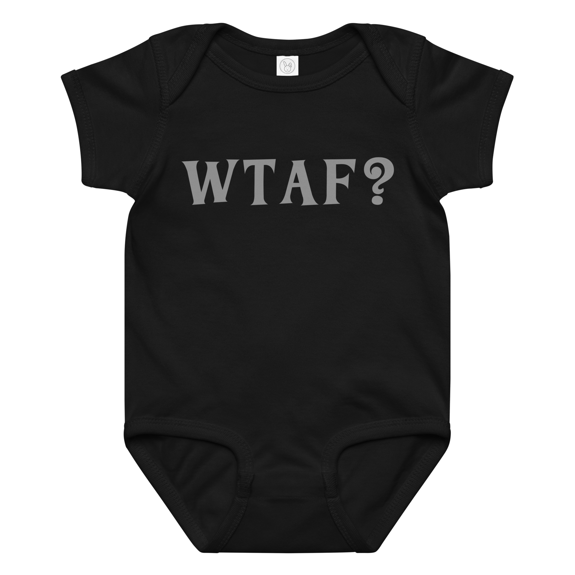 "WTAF?" printed on a black baby jersey bodysuit laying on a flat surface amongst other clothes
