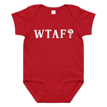 "WTAF?" printed on a red baby jersey bodysuit laying on a flat surface amongst other clothes