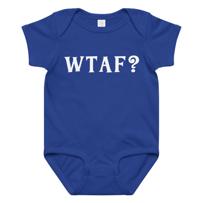 "WTAF?" printed on a royal baby jersey bodysuit laying on a flat surface amongst other clothes