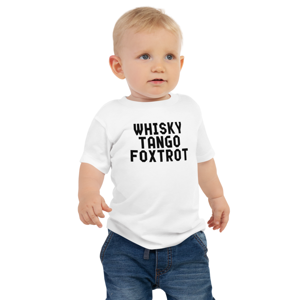 "Whisky Tango Foxtrot (What the f#ck)" printed on a white baby jersey short sleeve tee worn by a male