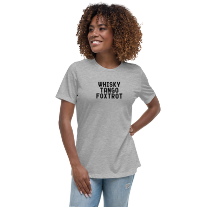 "Whisky Tango Foxtrot (What the f#ck)" printed on a athletic heather women's relaxed t-shirt worn by a female