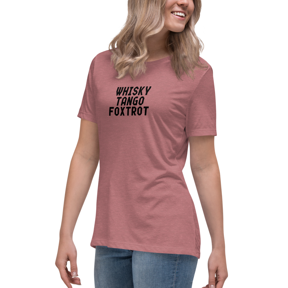 "Whisky Tango Foxtrot (What the f#ck)" printed on a heather mauve women's relaxed t-shirt worn by a female
