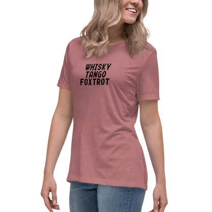 "Whisky Tango Foxtrot (What the f#ck)" printed on a heather mauve women's relaxed t-shirt worn by a female