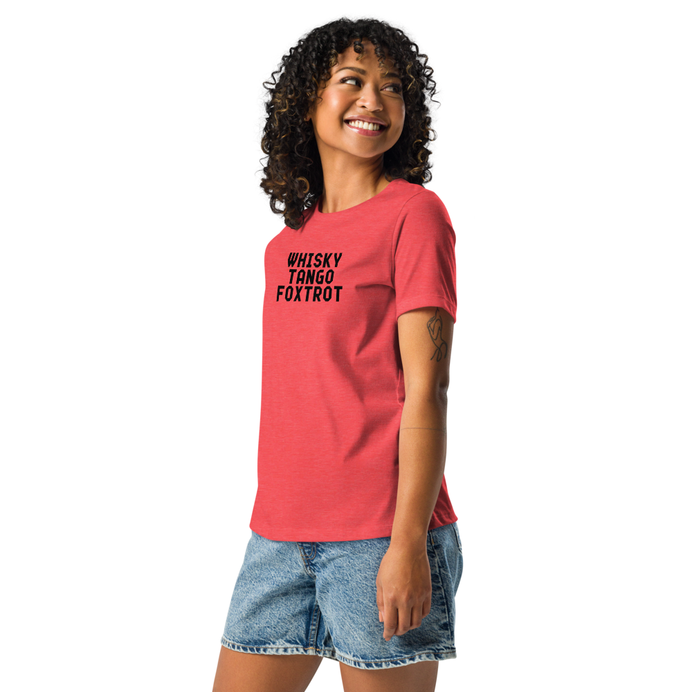 "Whisky Tango Foxtrot (What the f#ck)" printed on a heather red women's relaxed t-shirt worn by a female
