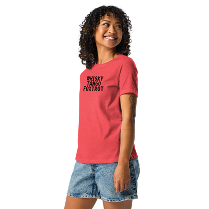 "Whisky Tango Foxtrot (What the f#ck)" printed on a heather red women's relaxed t-shirt worn by a female