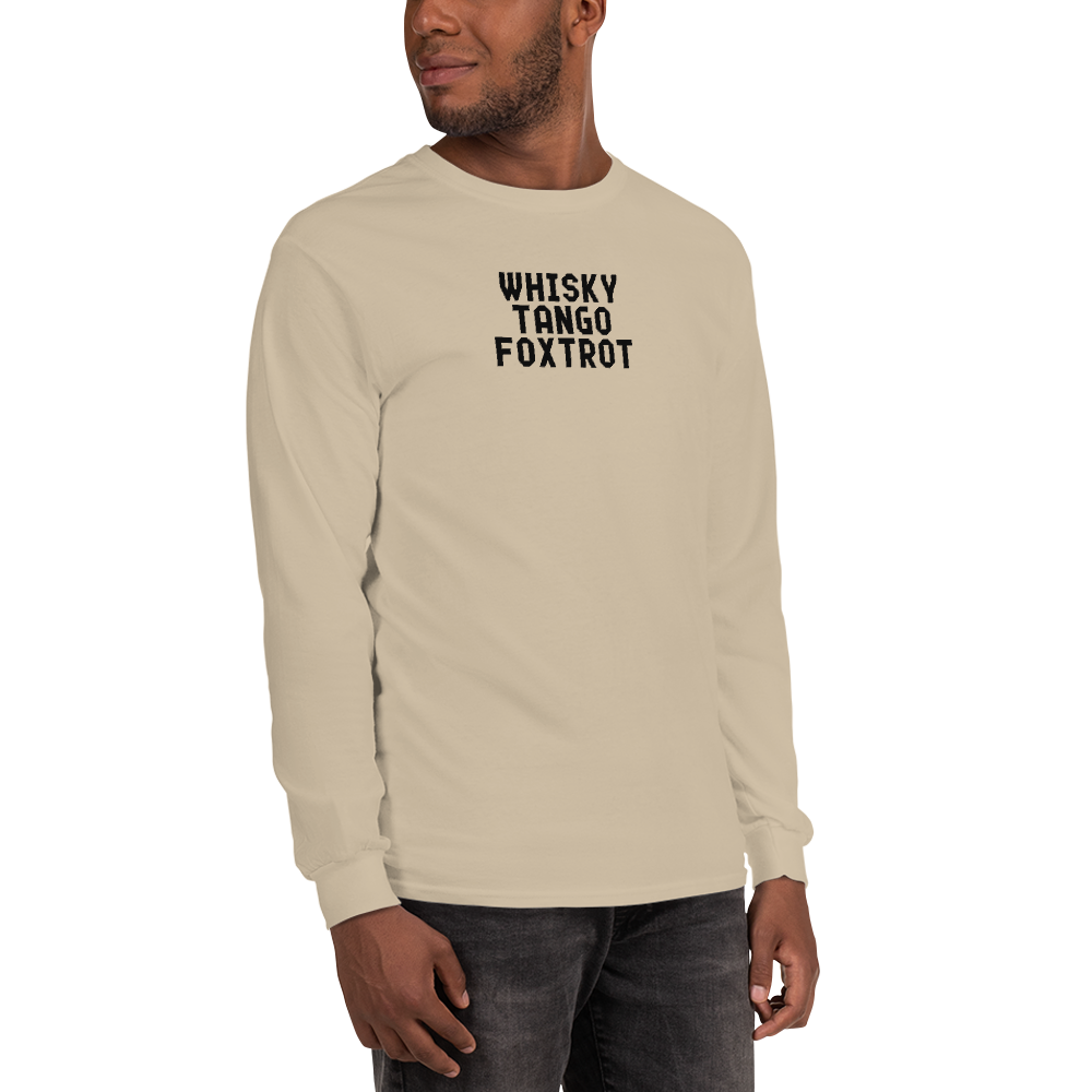 "Whisky Tango Foxtrot (What the f#ck)" printed on a sand men's long sleeve shirt worn by a male