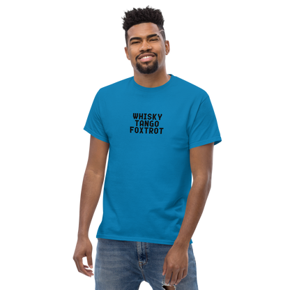 "Whisky Tango Foxtrot (What the f#ck)" printed on a sapphire unisex classic tee worn by a male
