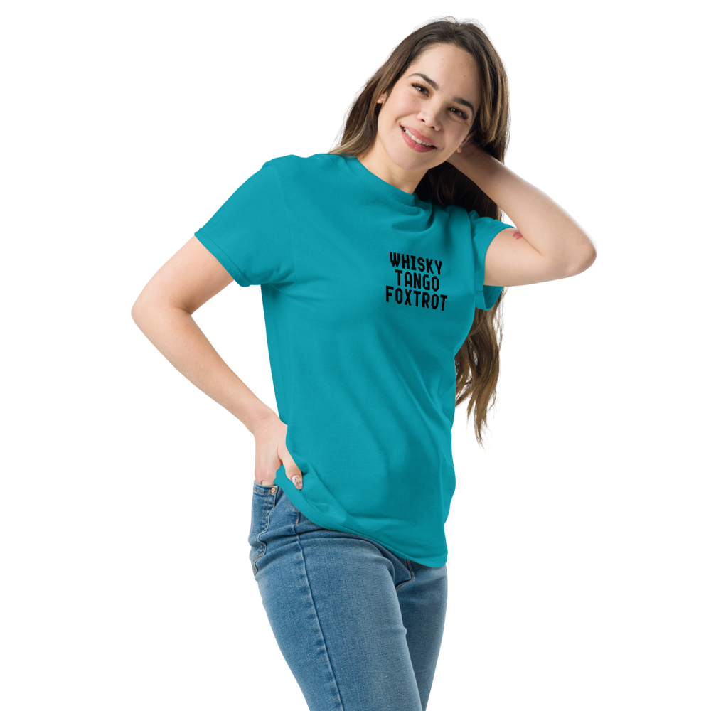 "Whisky Tango Foxtrot (What the f#ck)" printed on a tropical blue unisex classic tee worn by a female
