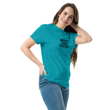 "Whisky Tango Foxtrot (What the f#ck)" printed on a tropical blue unisex classic tee worn by a female