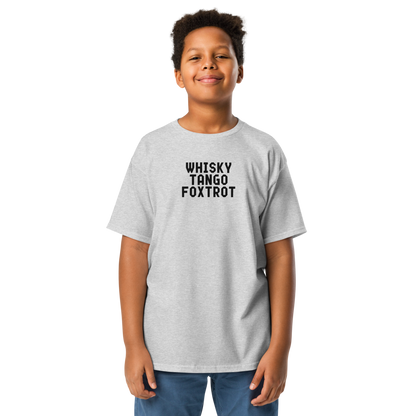 "Whisky Tango Foxtrot (What the f#ck)" printed on a sport grey youth classic tee worn by a male