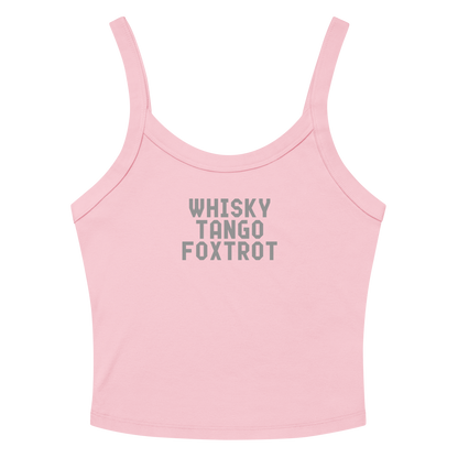 "Whisky Tango Foxtrot (What the f#ck)" printed on a solid pink blend women's micro-rib tanktop laying on a flat surface amongst sunglasses and shorts