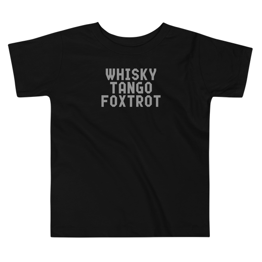 "Whisky Tango Foxtrot (What the f#ck)" printed on a black toddler short sleeve tee laying on a flat surface
