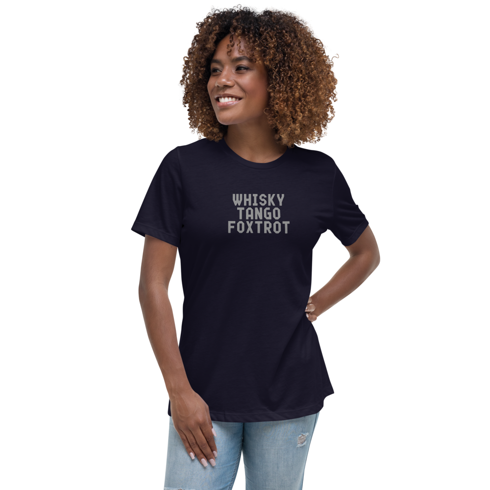 "Whisky Tango Foxtrot (What the f#ck)" printed on a navy women's relaxed t-shirt worn by a female