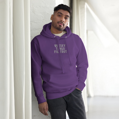 "Whisky Tango Foxtrot (What the f#ck)" printed on a purple unisex hoodie worn by a male