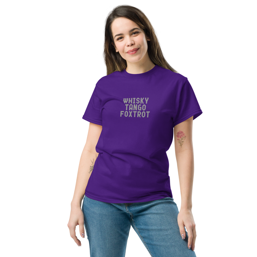 "Whisky Tango Foxtrot (What the f#ck)" printed on a purple unisex classic tee worn by a female