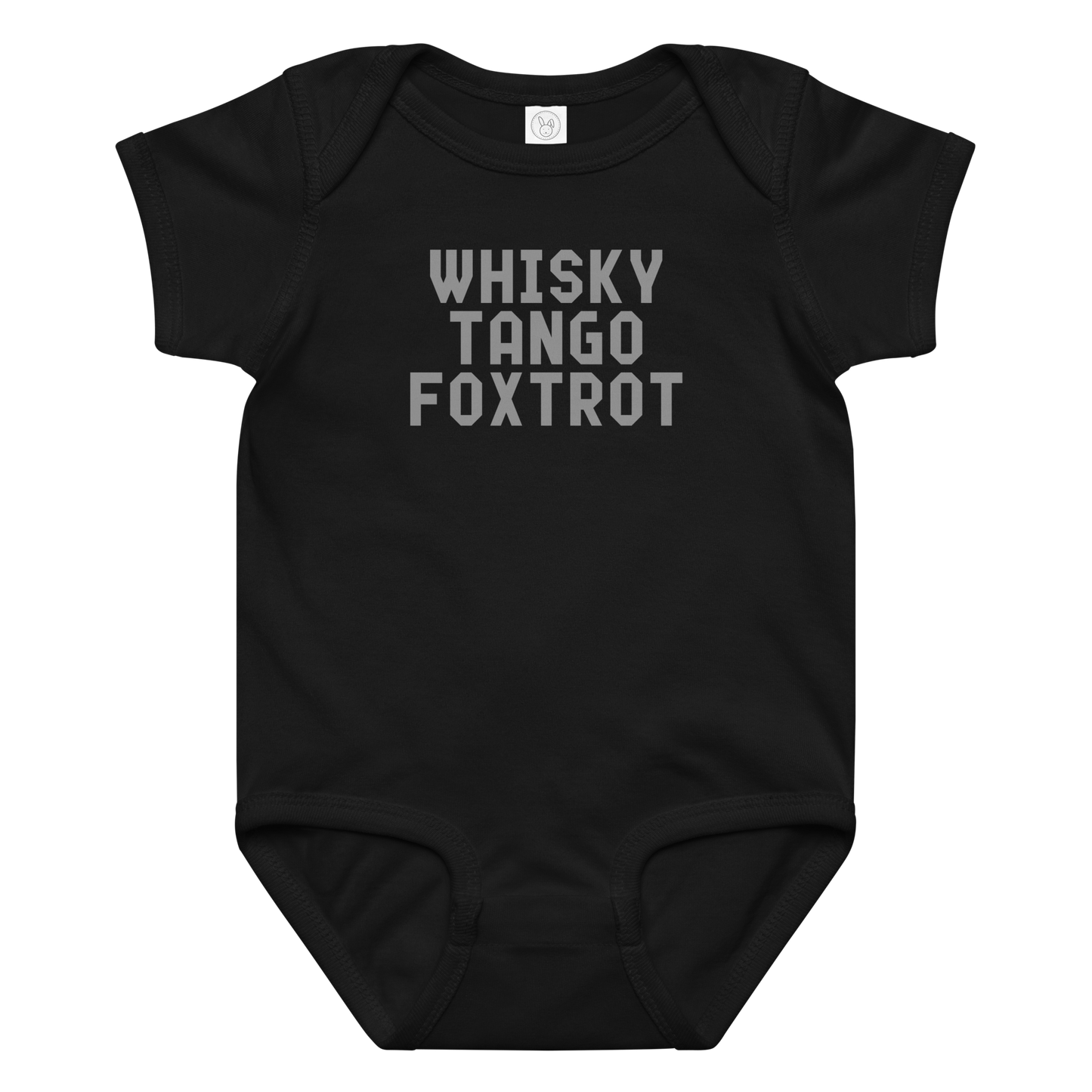 "Whisky Tango Foxtrot (What the f#ck)" printed on a black baby jersey bodysuit laying on a flat surface amongst other clothes