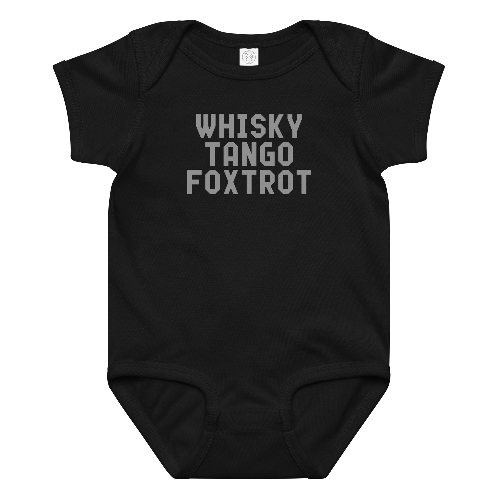 "Whisky Tango Foxtrot (What the f#ck)" printed on a black baby jersey bodysuit laying on a flat surface amongst other clothes