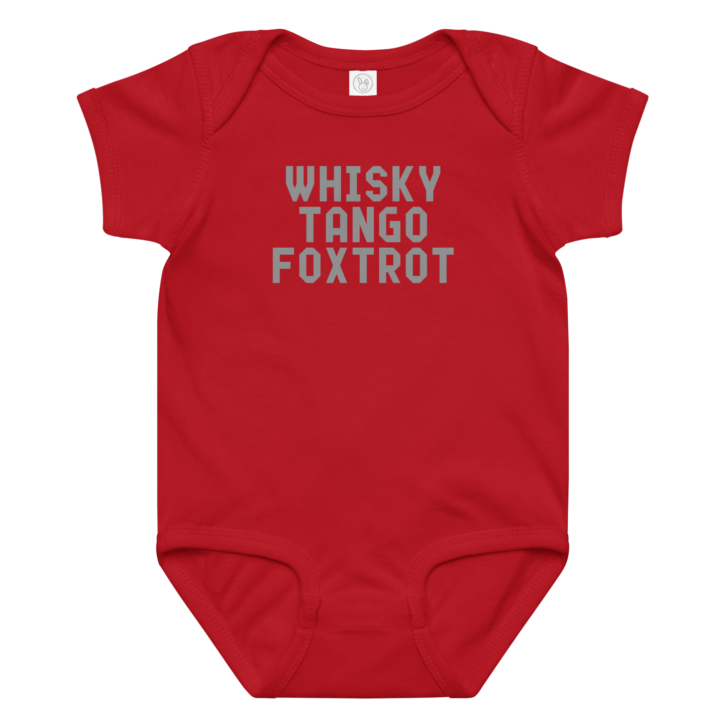 "Whisky Tango Foxtrot (What the f#ck)" printed on a red baby jersey bodysuit laying on a flat surface amongst other clothes