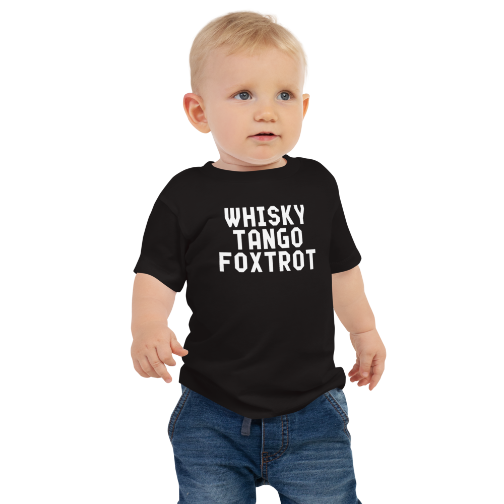 "Whisky Tango Foxtrot (What the f#ck)" printed on a black baby jersey short sleeve tee worn by a male