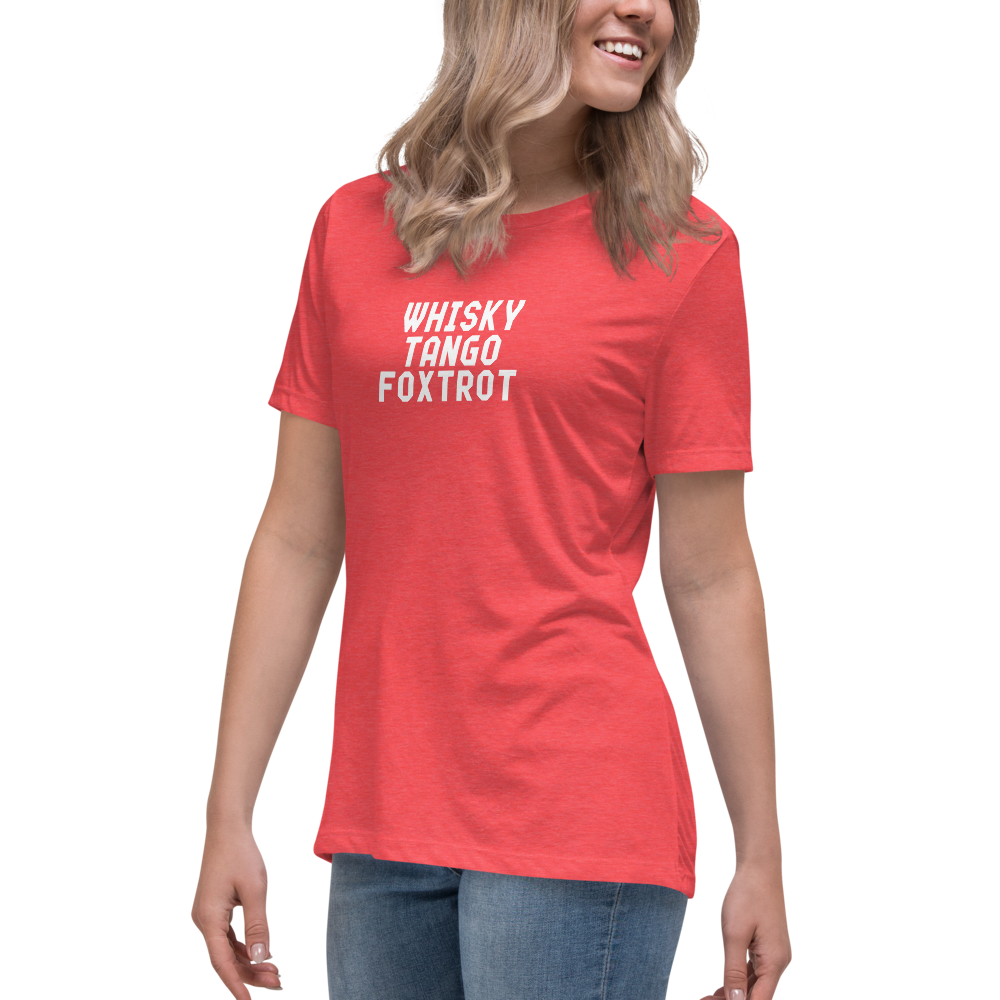 "Whisky Tango Foxtrot (What the f#ck)" printed on a heather red women's relaxed t-shirt worn by a female