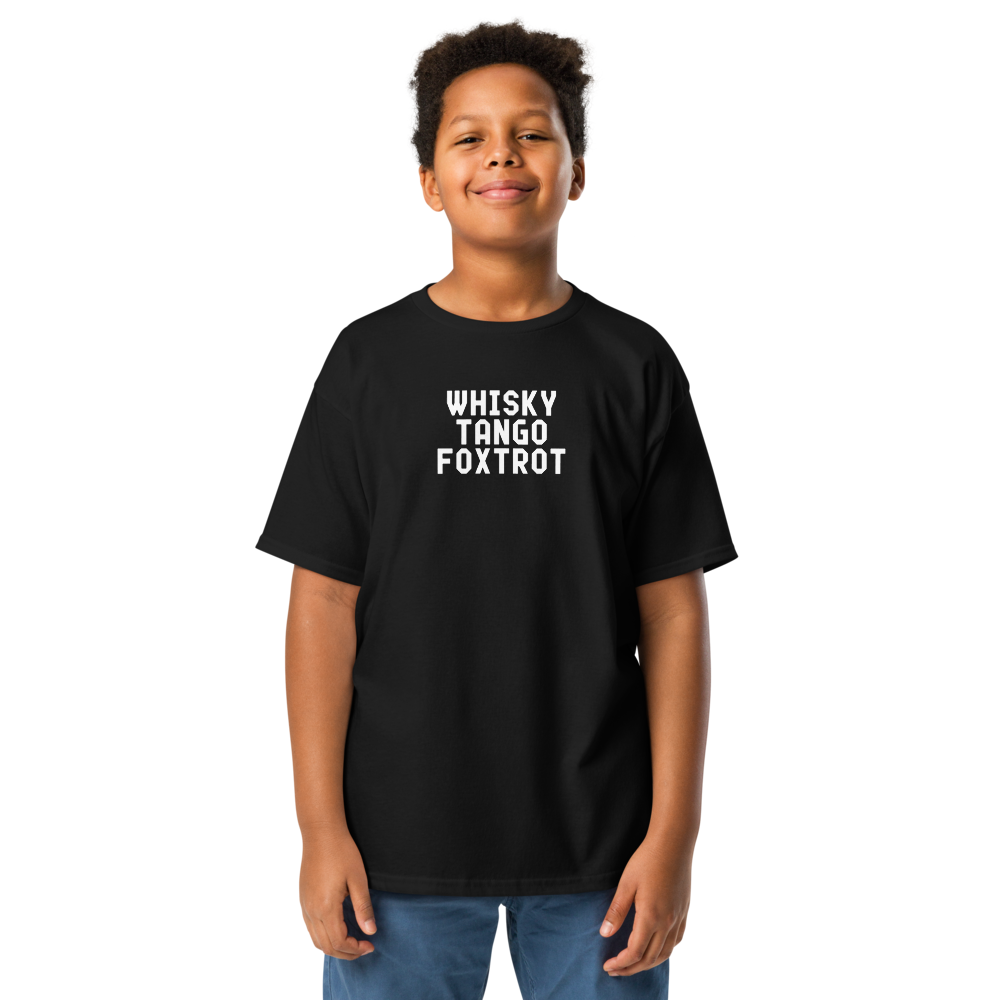 "Whisky Tango Foxtrot (What the f#ck)" printed on a black youth classic tee worn by a male