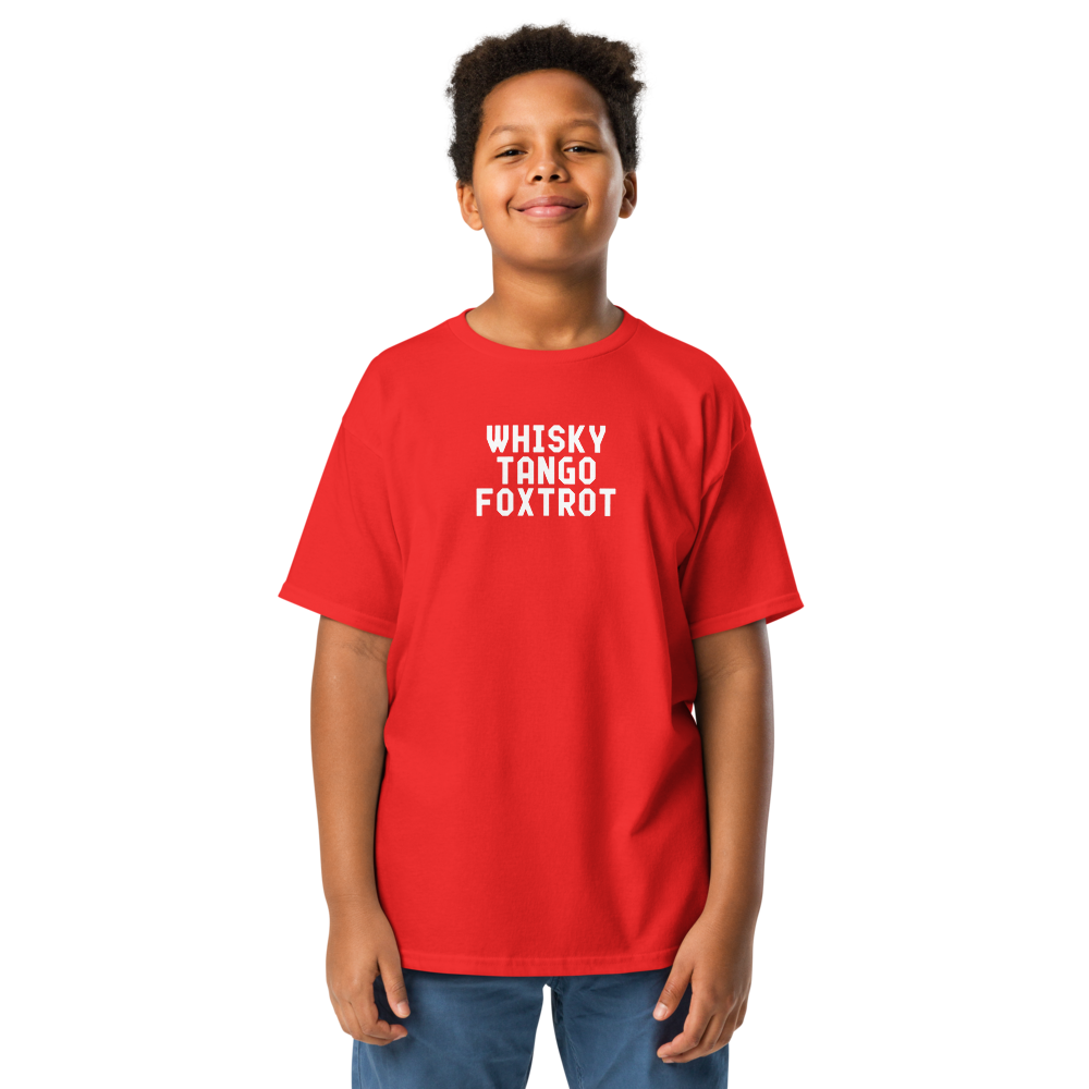 "Whisky Tango Foxtrot (What the f#ck)" printed on a red youth classic tee worn by a male