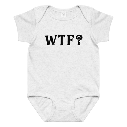 "WTF? (What the f#ck?)" printed on a ash baby jersey bodysuit laying on a flat surface amongst other clothes