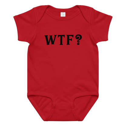 "WTF? (What the f#ck?)" printed on a red baby jersey bodysuit laying on a flat surface amongst other clothes