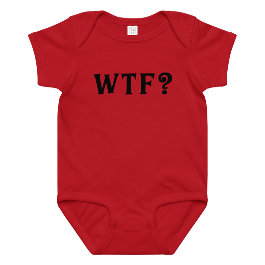 "WTF? (What the f#ck?)" printed on a red baby jersey bodysuit laying on a flat surface amongst other clothes
