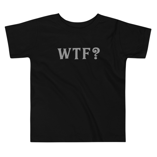 "WTF? (What the f#ck?)" printed on a black toddler short sleeve tee laying on a flat surface