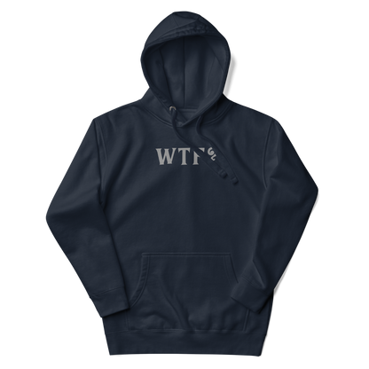 "WTF? (What the f#ck?)" printed on a navy blazer unisex hoodie laying on a flat surface with the hood up