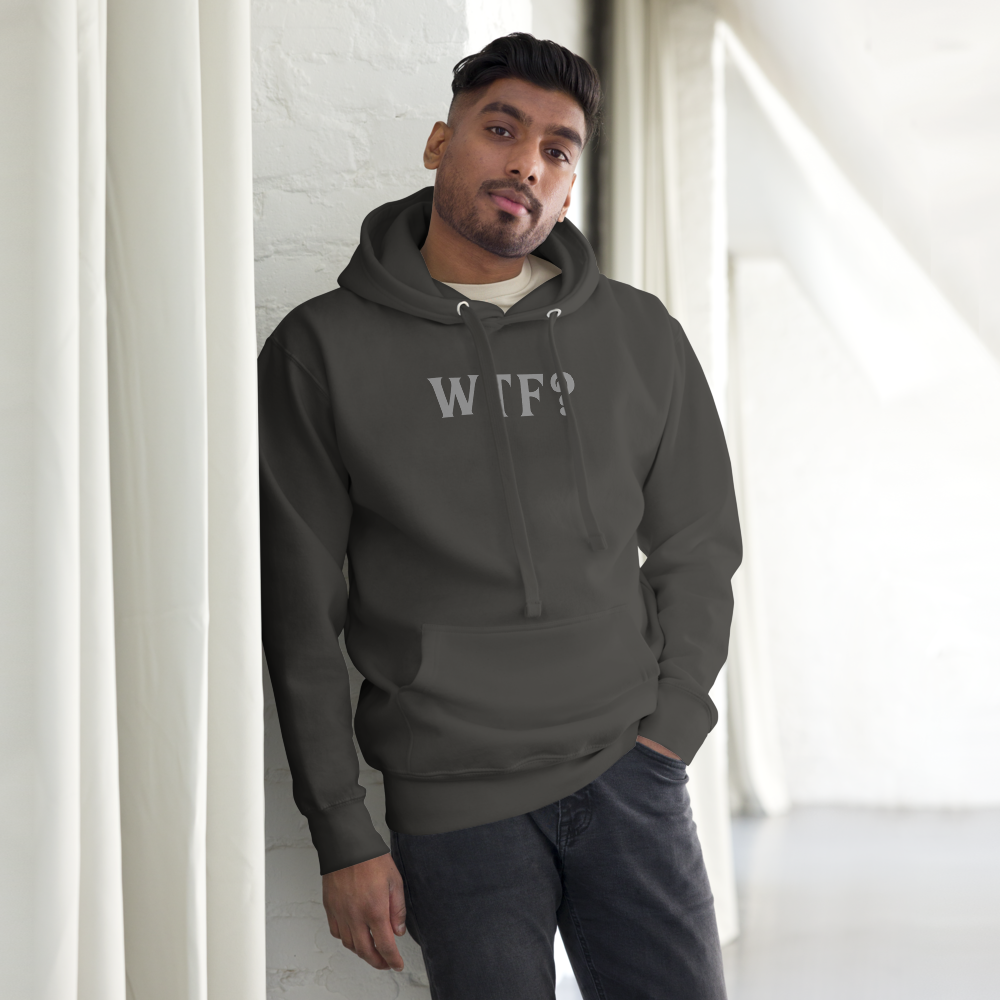 "WTF? (What the f#ck?)" printed on a vintage black unisex hoodie worn by a male