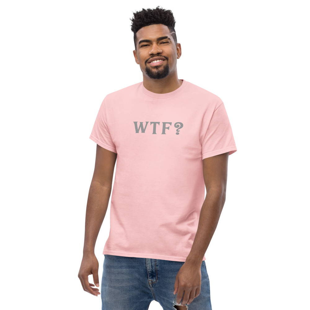 "WTF? (What the f#ck?)" printed on a light pink unisex classic tee worn by a male