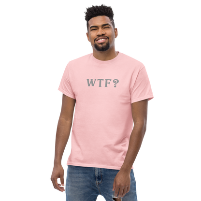 "WTF? (What the f#ck?)" printed on a light pink unisex classic tee worn by a male