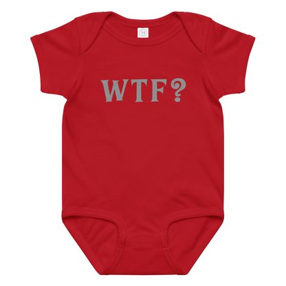 "WTF? (What the f#ck?)" printed on a red baby jersey bodysuit laying on a flat surface amongst other clothes